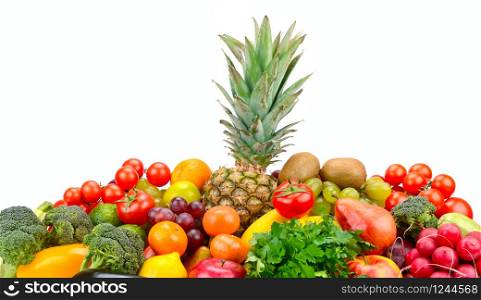 Set fruits and vegetables with pineapple in center isolated on white background.