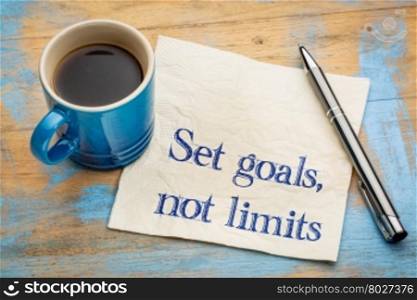 Set goals, no limits reminder or advice. Motivational words on a napkin with a cup of coffee.
