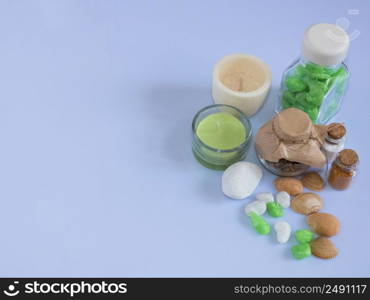 set ingredients and spice for aromatherapy and body care on a white surface with reflection. top view. SPA still life. the attributes of aromatherapy