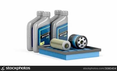 Set of automotive filters and bottles of motor oil