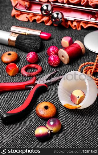 Set of beads for jewelry and womens tote bag with cosmetics
