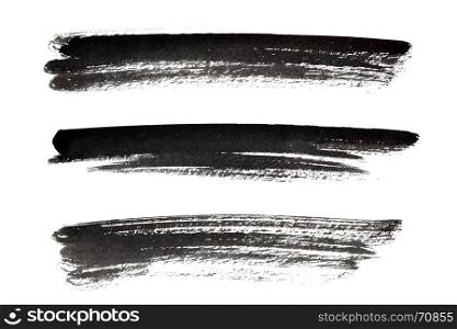 Set of black long ink strokes isolated on the white background