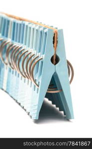 set of blue clothespin on a white background