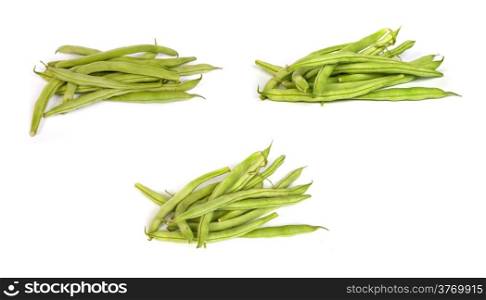 set of Bunches of fresh green beans isolated on white background.