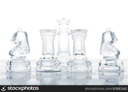 set of chess pieces are defending king, cut out from white