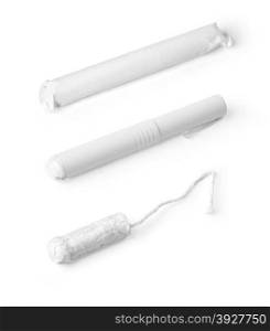 set of clean cotton tampons on white background