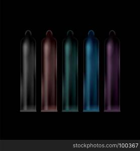 Set of Colored Condoms Isolated on Black Background. Set of Colored Condoms