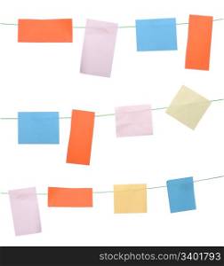 set of colored sticky notes hanging on wire (isolated on white background)