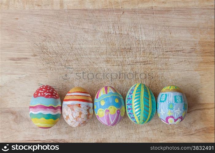 Set of colorful easter egg on wooden background