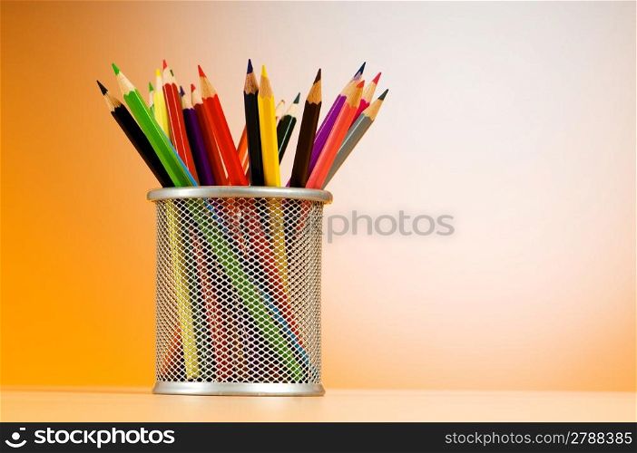 Set of colorful pencils in the holder