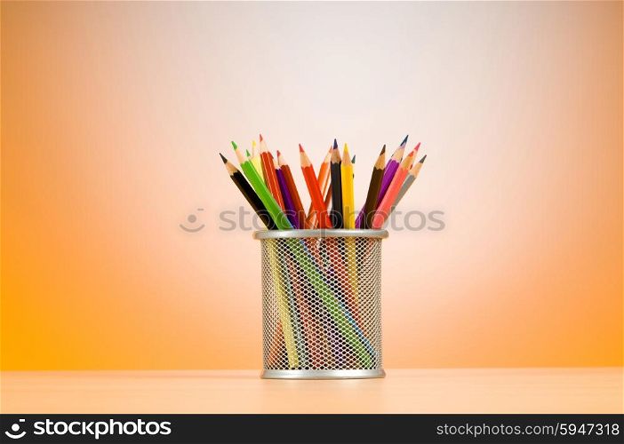 Set of colorful pencils in the holder