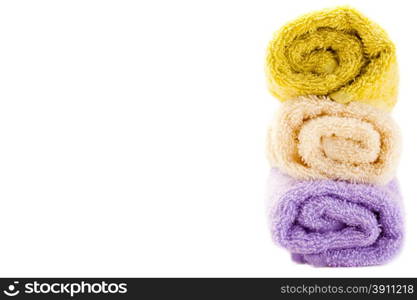 Set of colorful towels over white isolated background