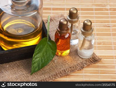 set of cosmetic oils for a SPA in a wooden box