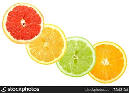 Set of cross citrus fruits. Isolated on white background. Close-up. Studio photography.