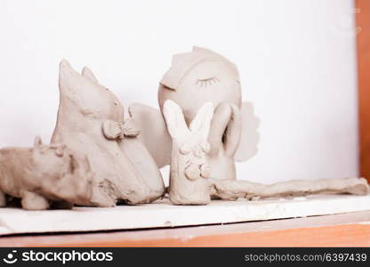 Set of cute animals made from modeling clay by children. Figures from plasticine