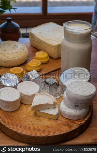 Set of different cheese: camembert, croton, mozzarella, smoked mozzarella and other