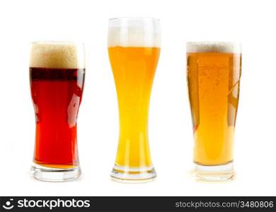 Set of different kind of beer at glasses isolated on a white background