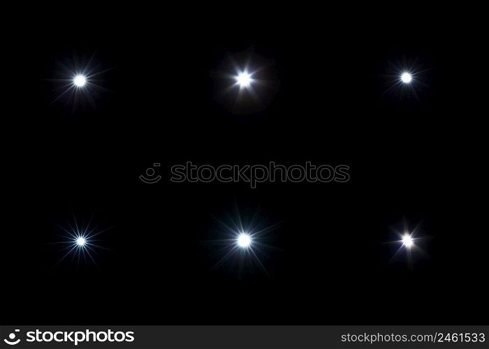 Set of flash lights with lens flare effect on black background