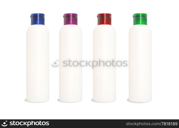 Set of four blank bottles for cometics on white