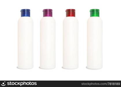 Set of four blank bottles for cometics on white