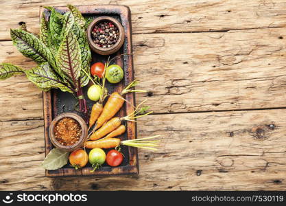 Set of fresh raw vegetables for diet salad.Salad ingredients.. Fresh vegetables on wooden table