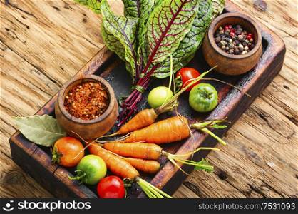 Set of fresh raw vegetables for diet salad.Salad ingredients.. Fresh vegetables on wooden table