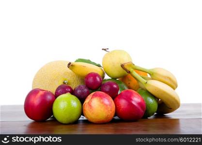 set of fruits isolated on a wooden table