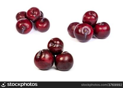 set of Group of plums isolated on a white background