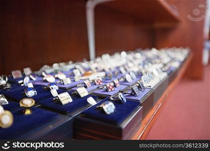 Set of hand cufflinks on display