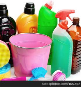 Set of household chemicals, bucket and brushes for cleaning isolated on white background.