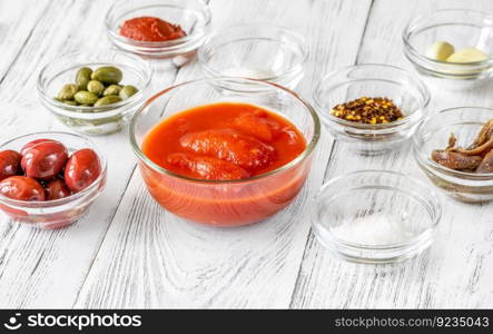 Set of ingredients for italian puttanesca sauce