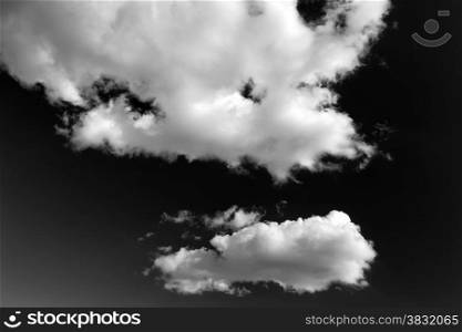 Set of isolated clouds over black
