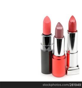 Set of lipsticks isolated on white background. Free space for text.