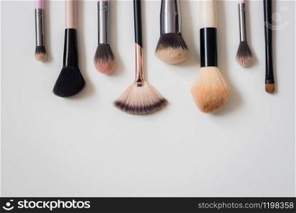 Set of makeup brushes and other accessories. Products for makeup on white background
