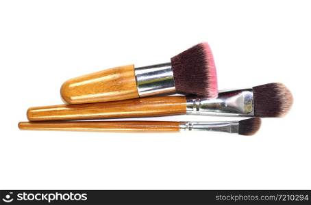 Set of makeup brushes isolated on white background.