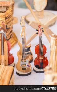 Set of models of musical instruments made of wood