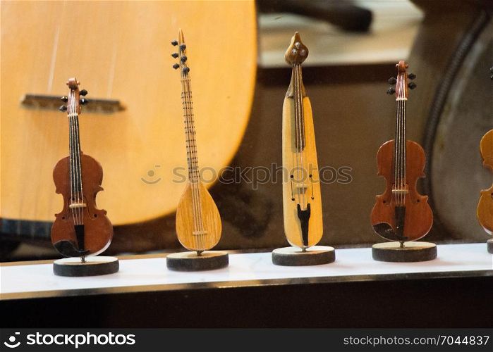 Set of models of musical instruments made of wood