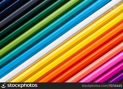 Set of multicolor pencils, abstract striped background. Multicolor striped background