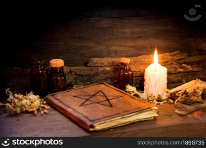 set of objects for witchcraft rituals, on rustic wood. set of objects symbols of esoteric rituals