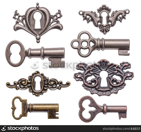Set of old keys and keyholes isolated on white
