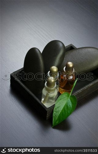 set of perfume oils in a wooden box