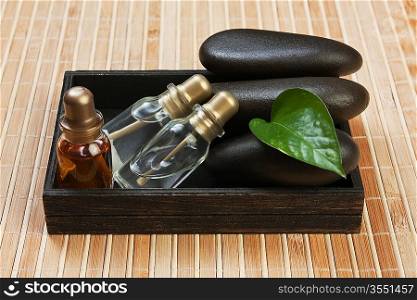 set of perfume oils in a wooden box