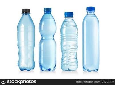 Set of plastic bottles with lids isolated on white background