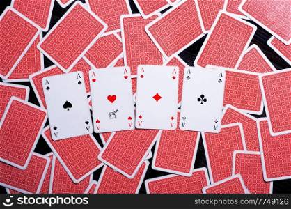 set of playing cards with open aces. Gambling, hobby and divination concept