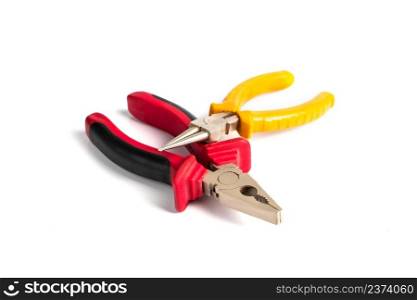 Set of pliers with insulating handles on a white background. Tools for repair.. Set of pliers with insulating handles on white background. Tools for repair.