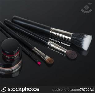 Set of professional makeup and cosmetics. on a black background isolated