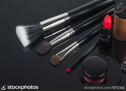 Set of professional makeup and cosmetics. on a black background isolated