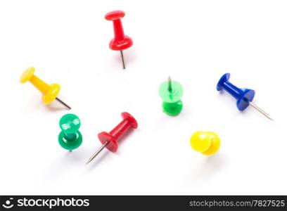 Set of push pins in different colors, with real shadows, isolated on white background.