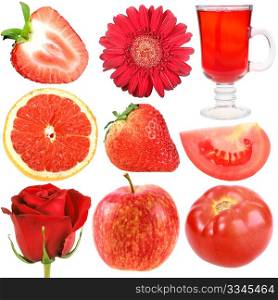 Set of red fruits, vegetables and flowers. Isolated on white background. Close-up. Studio photography.