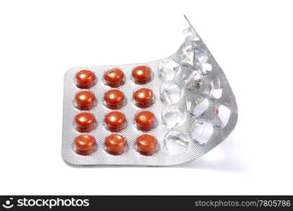 Set of red pills isolated on white